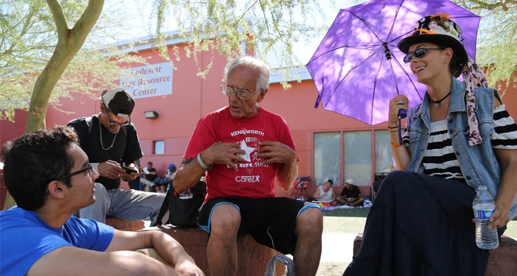 Humans of SHOW project volunteers interviewing homeless